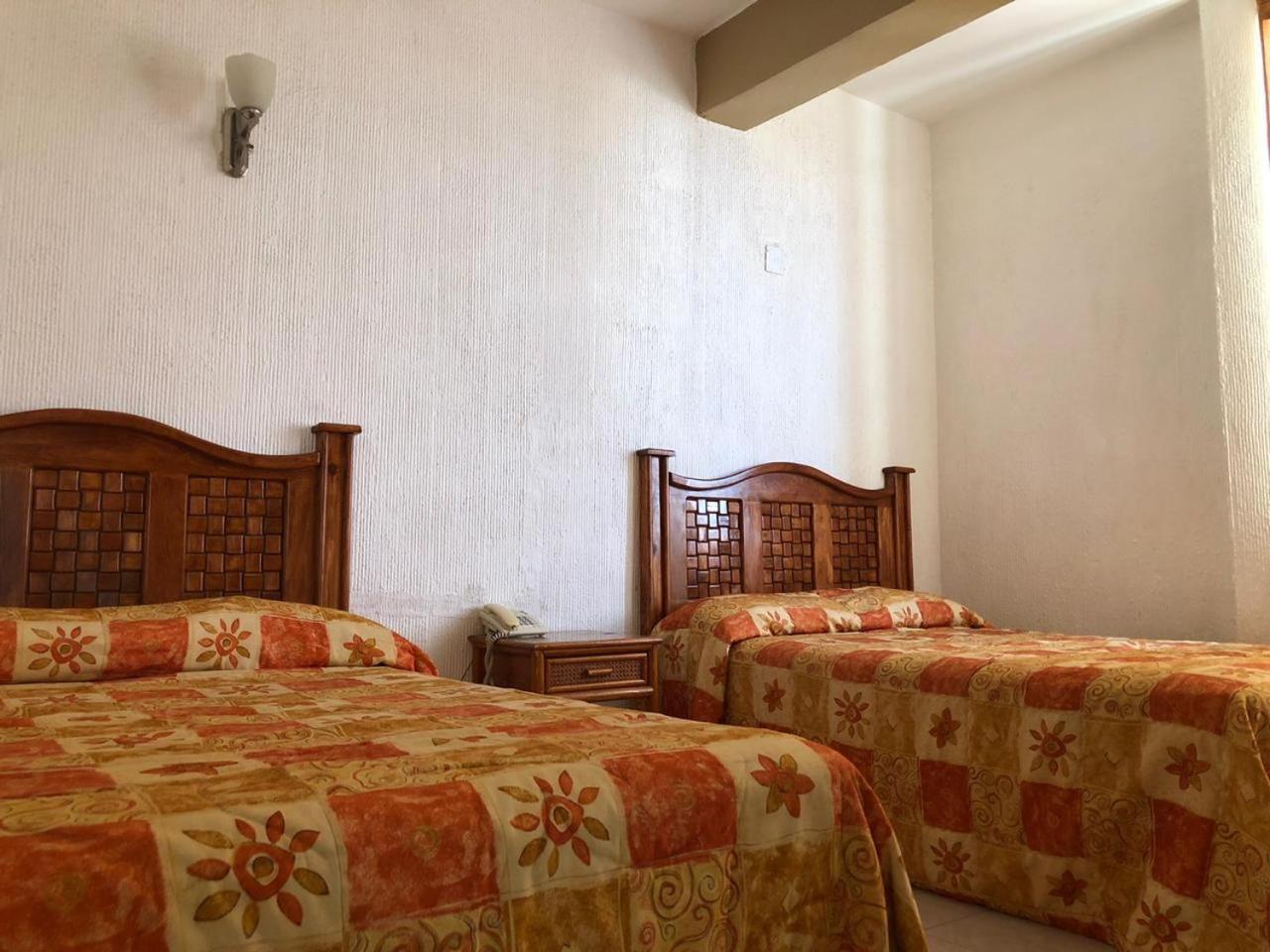 Hotel Sol Del Pacifico ลาซาโร การ์เดนาส ภายนอก รูปภาพ