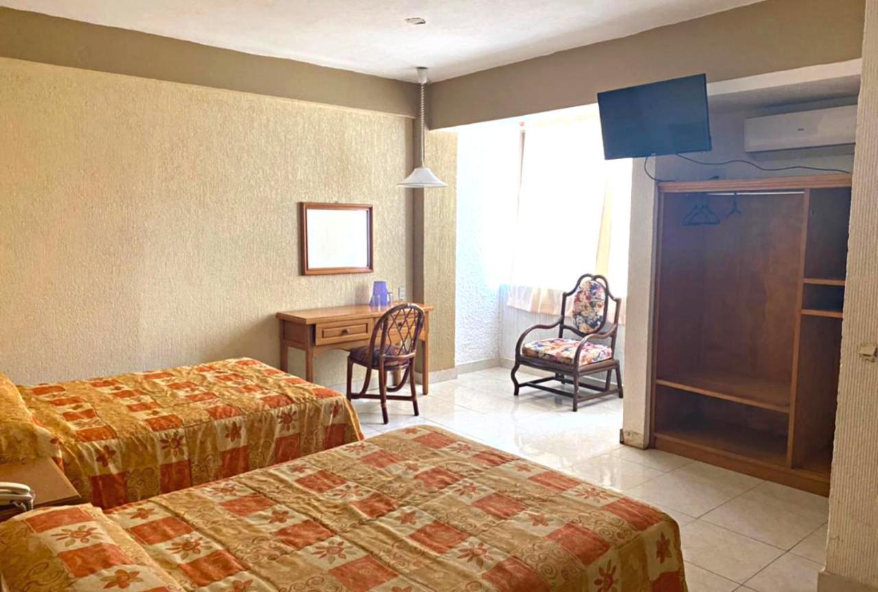 Hotel Sol Del Pacifico ลาซาโร การ์เดนาส ภายนอก รูปภาพ
